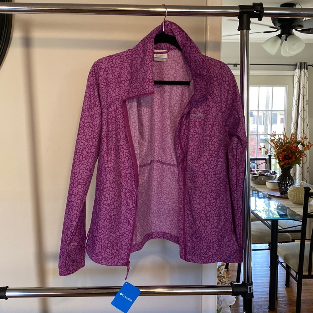 Rain jacket. Brand new with tags.